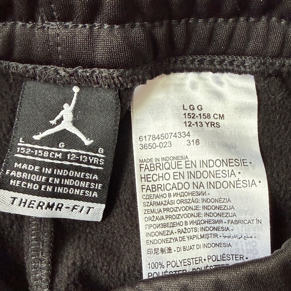 Two pairs of Jordan Therma-Fit Black Pants 
Boys size 12-13 - Picture 2 of 4